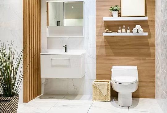 Modern bathroom with floating vanity, mirror, and wood-paneled accent wall